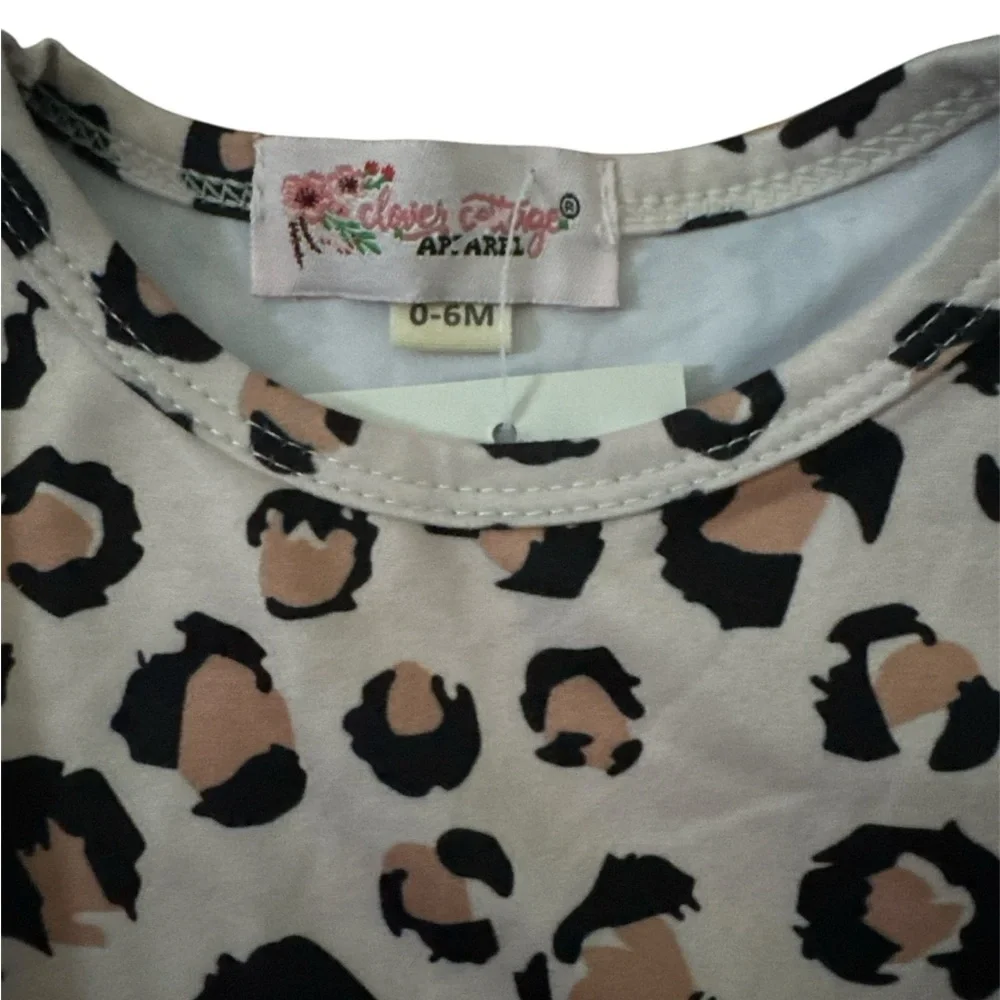 Boutique Clover cottage collection. Leopard Print Ruffle Sleeve Jumpsuit. 0-6mon